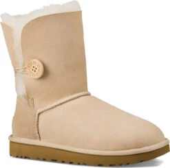 UGG Women's Bailey Button II 13 UGG Women's Bailey Button II -Famous Shoe Store ugg bailey button ii sand 1016226 san 21228.1568902872